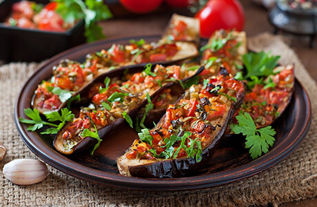 Roasted aubergine with tomato and garlic recipe